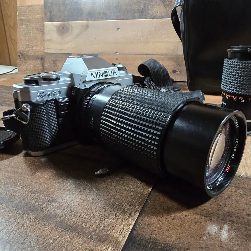 Minolta X370 with a JC Penny f=80 to 200mm zoom lens and prospect f=28-70mm lens